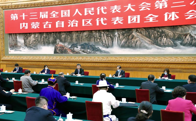 5月22日，中共中央總書記、國家主席、中央軍委主席習(xí)近平參加十三屆全國人大三次會議內(nèi)蒙古代表團的審議。 新華社記者 謝環(huán)馳 攝